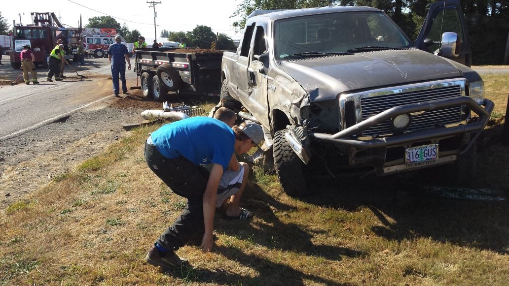 Trask River Road closed temporarily when trucks collide News