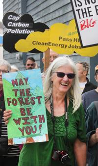 Marchers match passion for climate message (photos + videos)