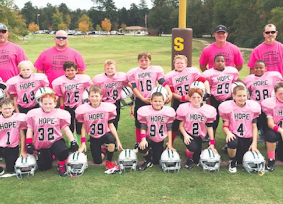 Youth football league raises breast cancer awareness, Herald Community  Newspapers