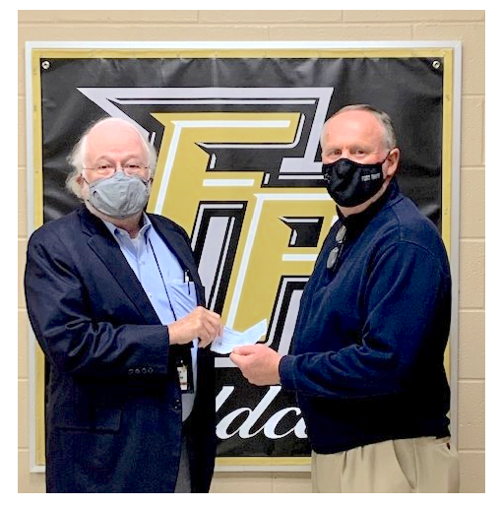 Master Gardeners present Fort Payne superintendent with $2,000 check
