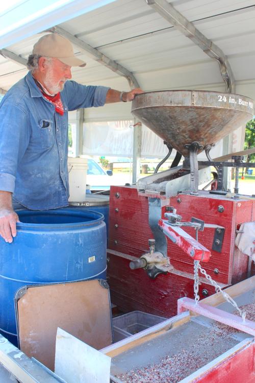 100-year-old grist mill stops at downtown Farmers Market