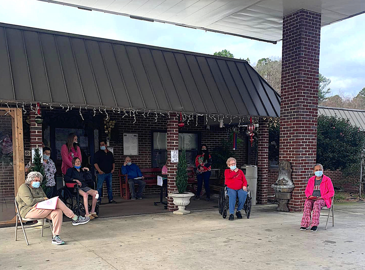 Collinsville Nursing Home residents visited by student carolers News
