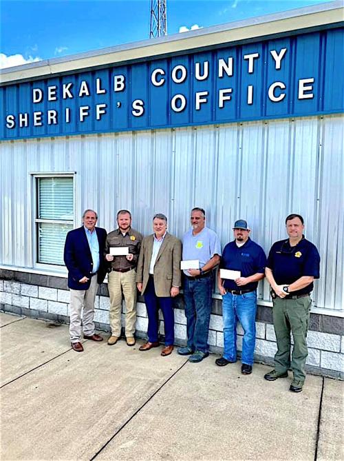 DCSO, fire association and rescue squad receive checks for uniform beacons