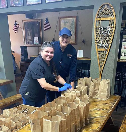 Helping Hands: Roadside 'Que donates 70 meals to Bread of Life food ministry