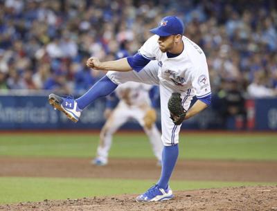 Gausman matches career high with 13 Ks, Blue Jays hit 3 homers to