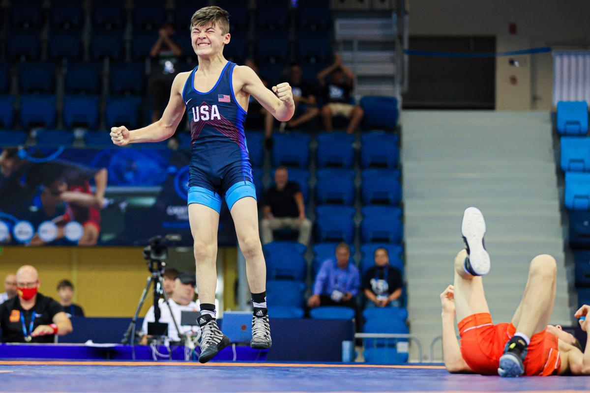 GOOD AS GOLD Johnstown's Bo Bassett pins Russian to win title at Cadet