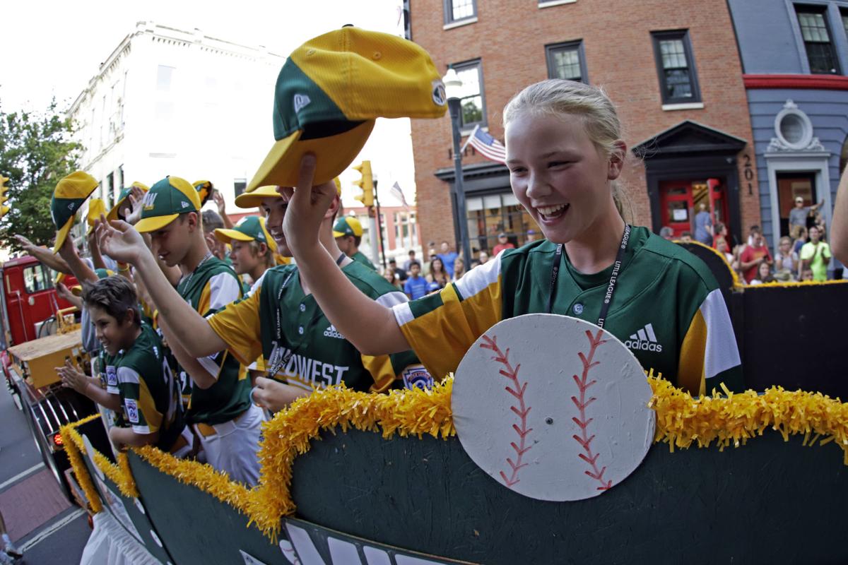 Mo'ne Davis gives advice to Maddy Freking, the first girl to play