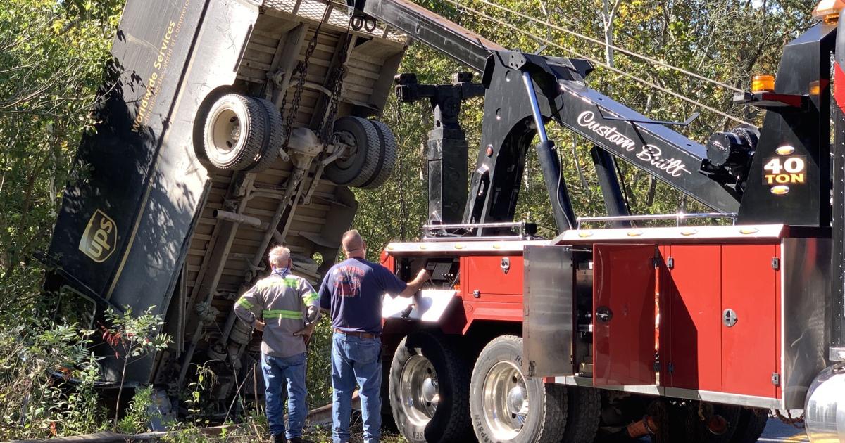 UPS truck travels over embankment, driver injured | Local News ...