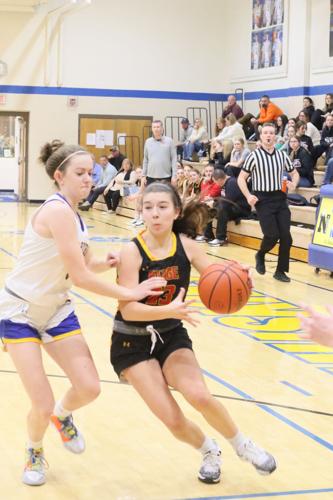 Sydney Snyder drives to the basket