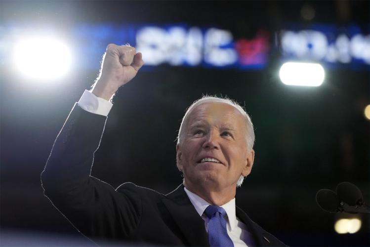 Biden gets a rousing ovation from Democrats as he gives Harris an