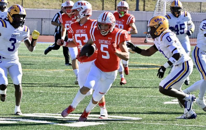 Topranked Fort Hill runs past East/World of Inquiry, 520 Local