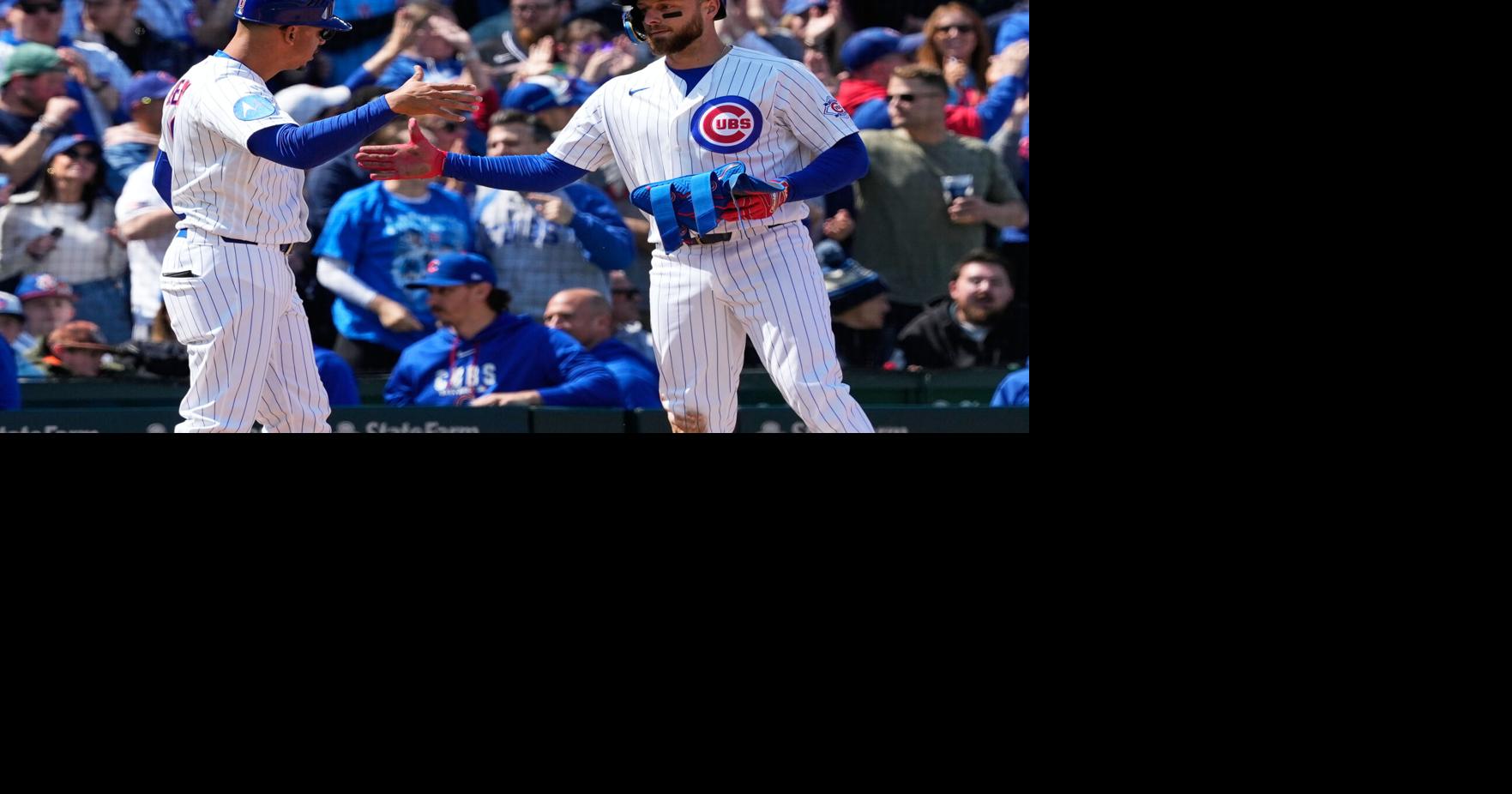 Busch stars as the surging Cubs beat the Diamondbacks 8-4 for their 5th consecutive win