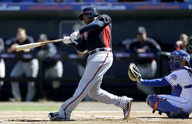 Atlanta Braves left fielder Justin Upton (L), brother B.J. Upton