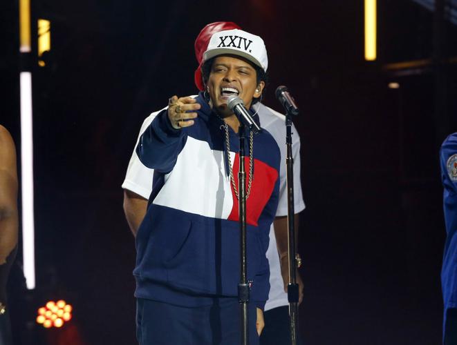 Why Bruno Mars believes clothes make the album