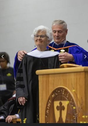 Rita McCaffrey honored for lifetime of humane work at St. Michael’s College graduation