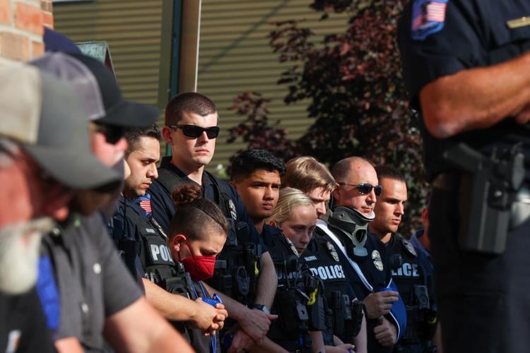 Community gathers at vigil for officer killed in crash | Local News ...
