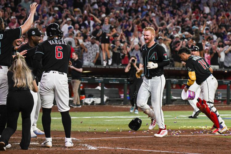 Two months after getting cut, Pavin Smith's game-ending homer gives D ...