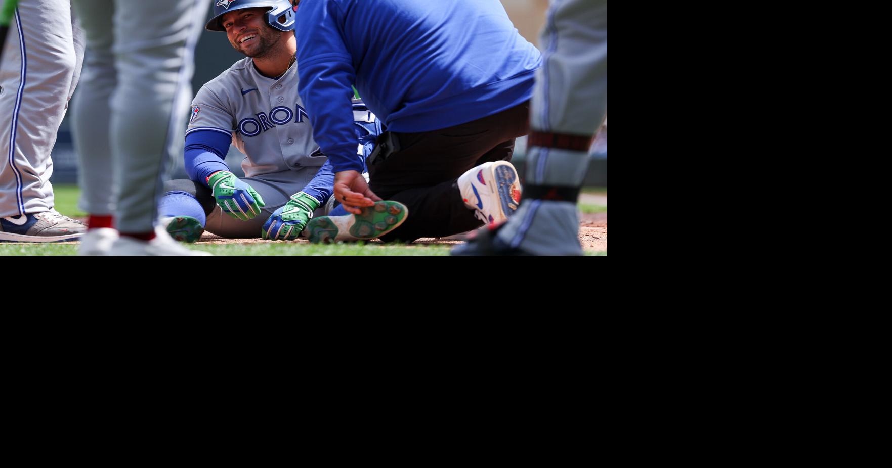 George Springer leaves Blue Jays game after being hit by pitch on left foot, but X-rays are negative