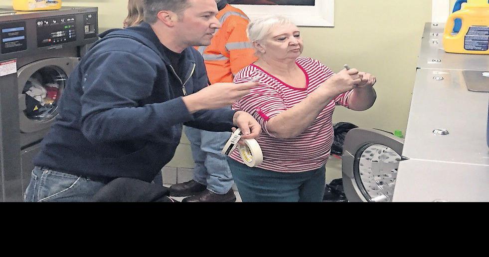 Church lends a hand at Busy Bubble laundromat