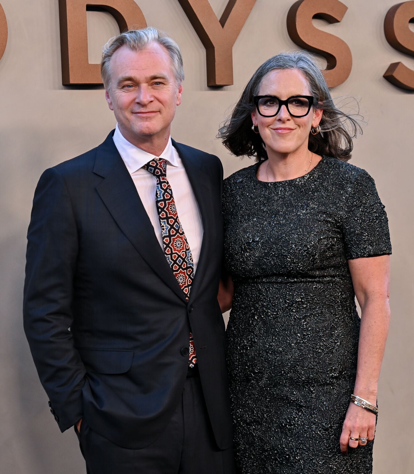 NY Premiere of "The Odyssey". Sir Christopher Nolan and Dame Emma Thomas officially launched the U.S. press run for their epic fantasy action film, The Odyssey, at its star-studded New York City premiere on July 14, 2026.The filmmaking power couple—recently knighted and damed by the King of England—personally introduced the film on stage to the Manhattan crowd ahead of its worldwide theatrical release on Friday, July 17, 2026.