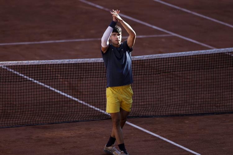 Carlos Alcaraz wins the French Open for a third Grand Slam title at 21