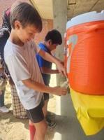 Shiver Elementary 5th grade class holds lemonade stand for charity