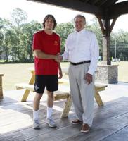 Boy Scout builds tables for TU’s Magnolia Pavilion