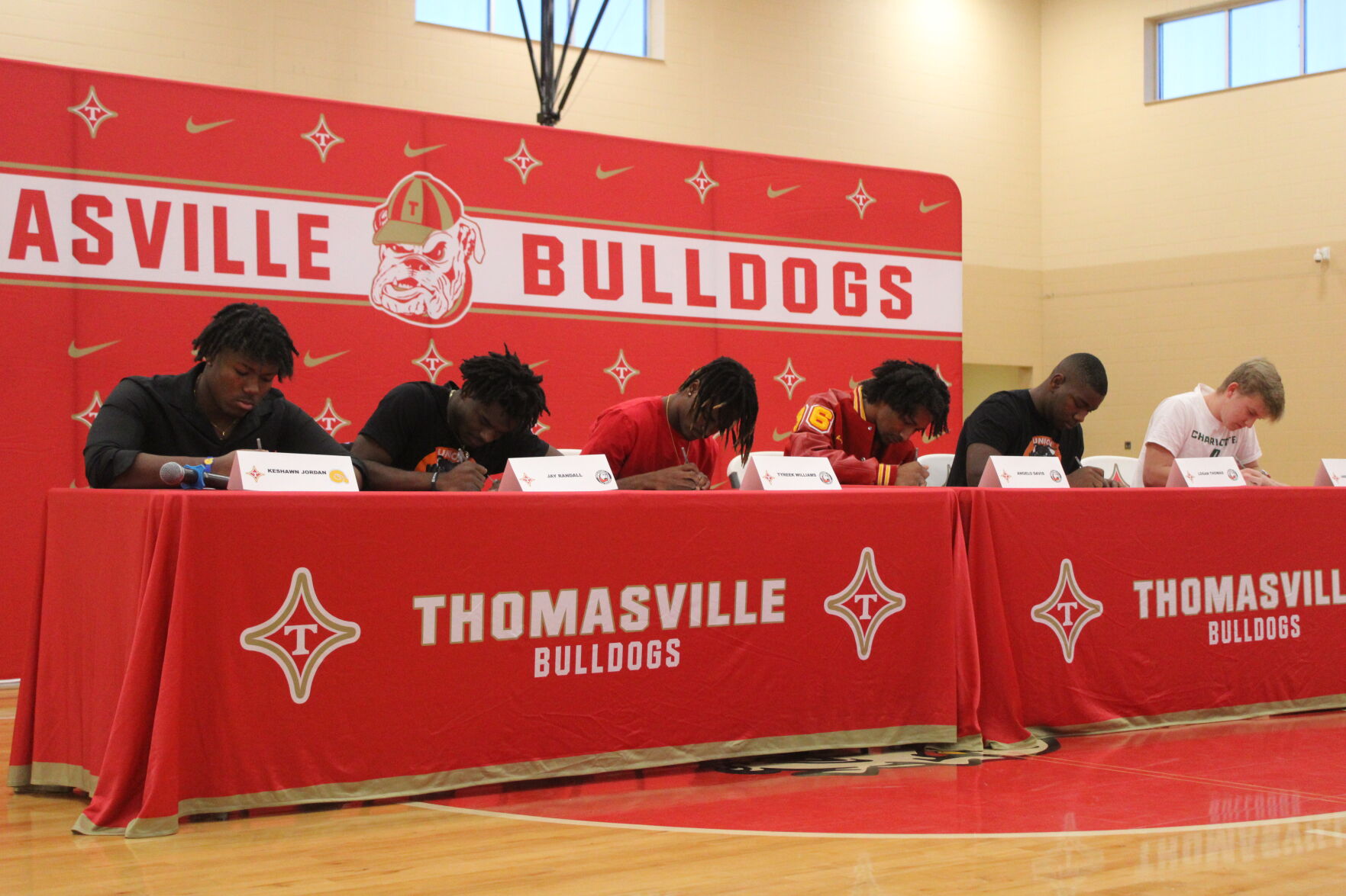 Six Thomasville Bulldogs Sign to Play College Football: Future Plans Revealed