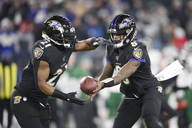 Ravens-Titans playoff game loaded with Heisman winners