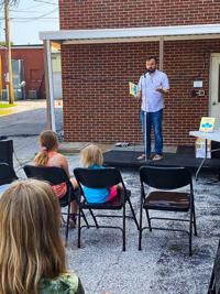 Bo Harris shares reading at Tails and Tales library reading event