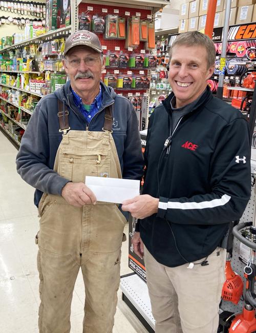 Baker accepts donation from Akridge Farm Supply