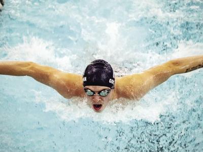 Goodman sets new ACHS swim record