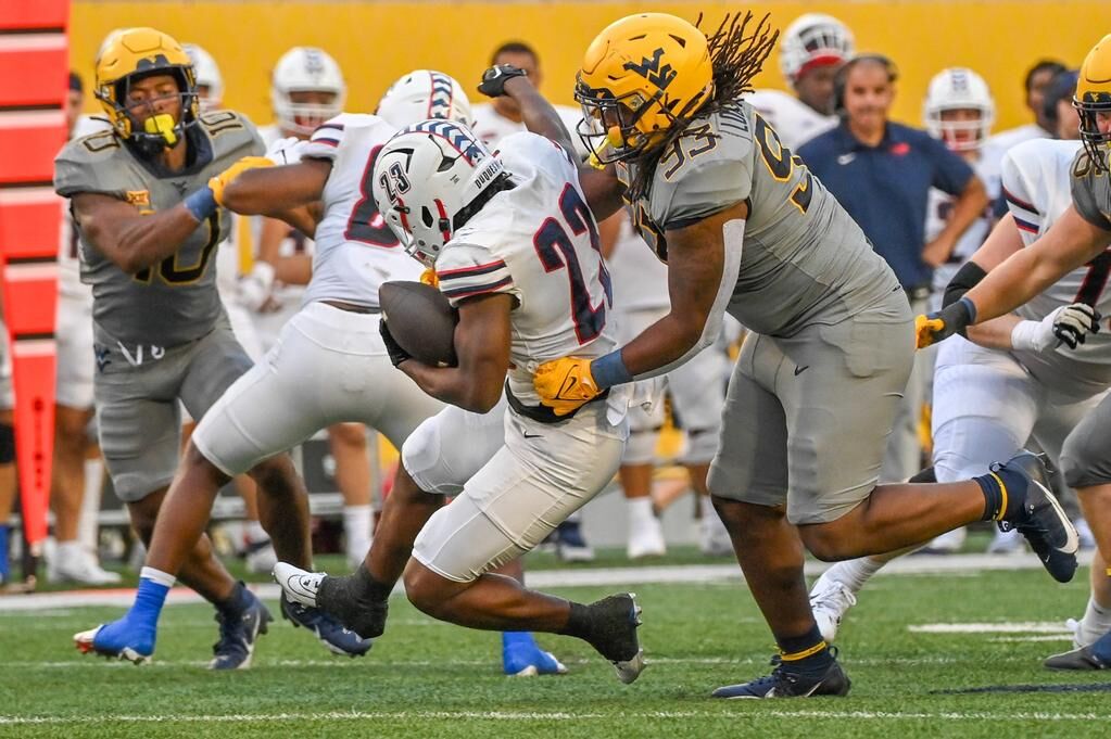 Improved physicality, communication requirements for WVU's defense, Blue  Gold News