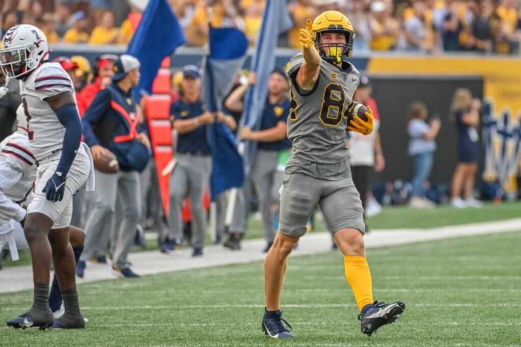 West Virginia football dominates Duquesne after long weather delay