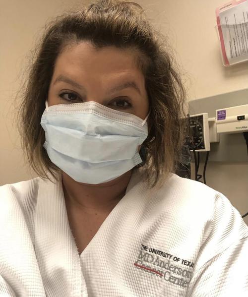 Brandy Gum wearing MD Anderson garb.jpg