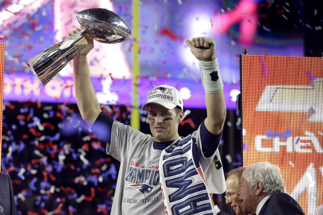 Download Tom Brady Awards And Championship Trophies Wallpaper