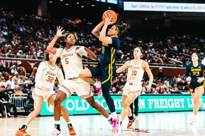 WVU's JJ Quinerly reaches 1,000 points milestone in win over UCF | WVU ...