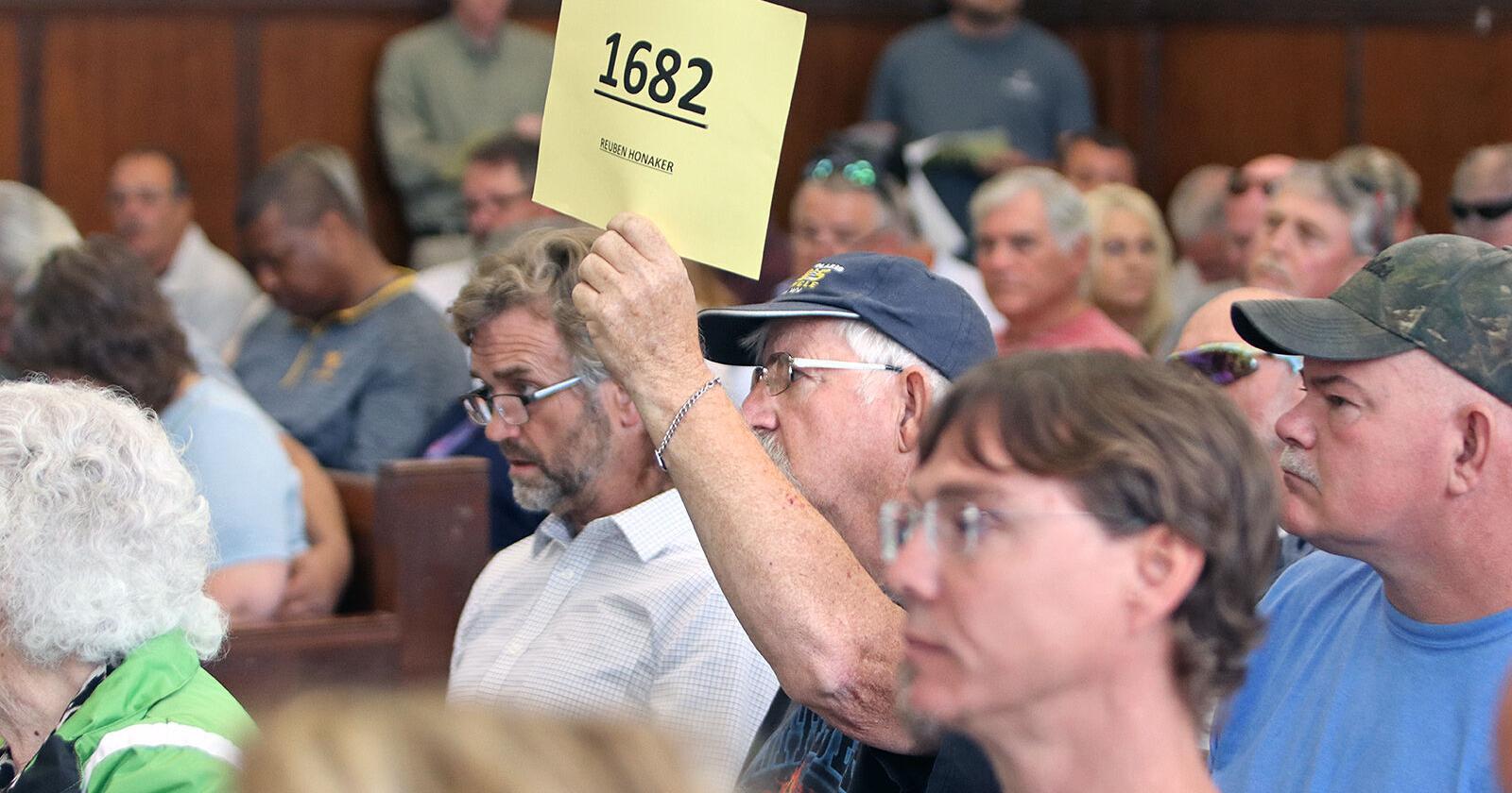 Going, going ... not quite gone; Justice-owned properties sold at tax sale auction - Vimarsana News