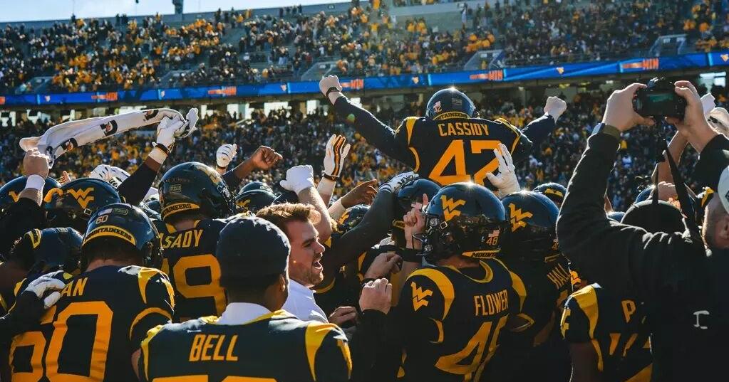 Mountaineers hang on to beat Cincinnati at home 45-42