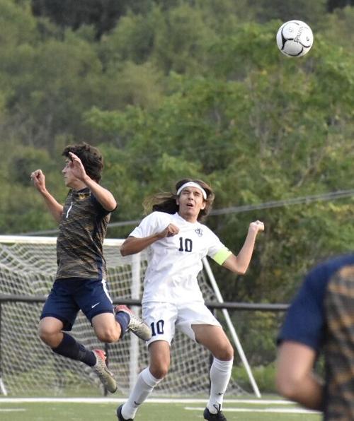 East west boys soccer.jpeg
