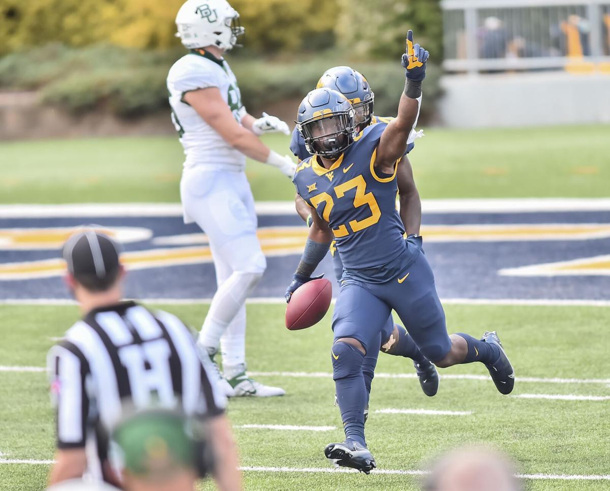 COLUMN: Antiquated rules for an evolving, modern game. The helmet rule must  go., WVU Mountaineers