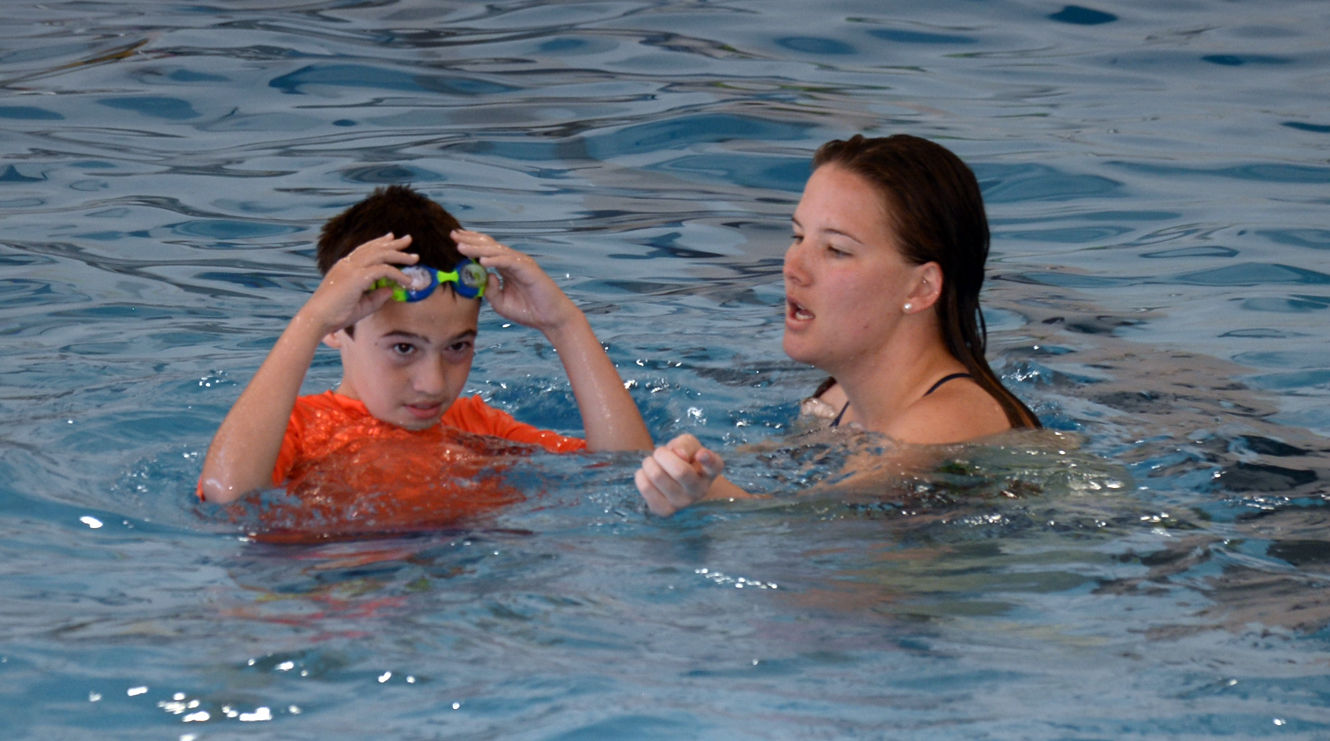 FSU swimmers pair with Autism Society for swimming lessons fun