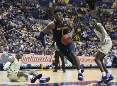 Wvu Beats Rhode Island 86 81 Sports Timeswv Com