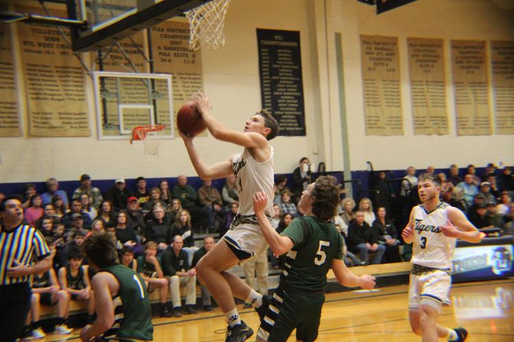 NPM routs Athens, Sayre for twelve straight wins Basketball