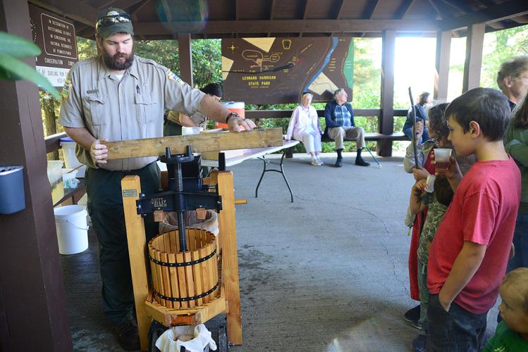 Visitors sip cider at state park Local