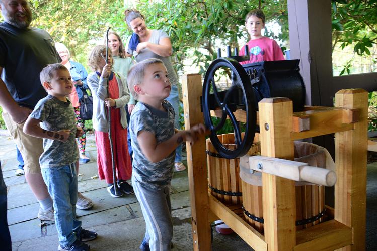 Visitors sip cider at state park Local