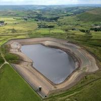 An aerial photo shows falling water levels have exposed the banks of Rooden Reservoir, northern England, as the UK experienced its warmest summer on record