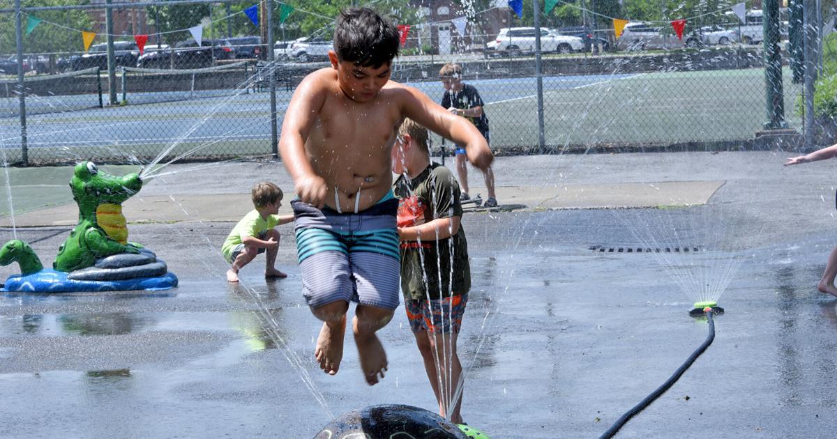Fun in the park: Sprinklers offer cooling option while pool is closed
