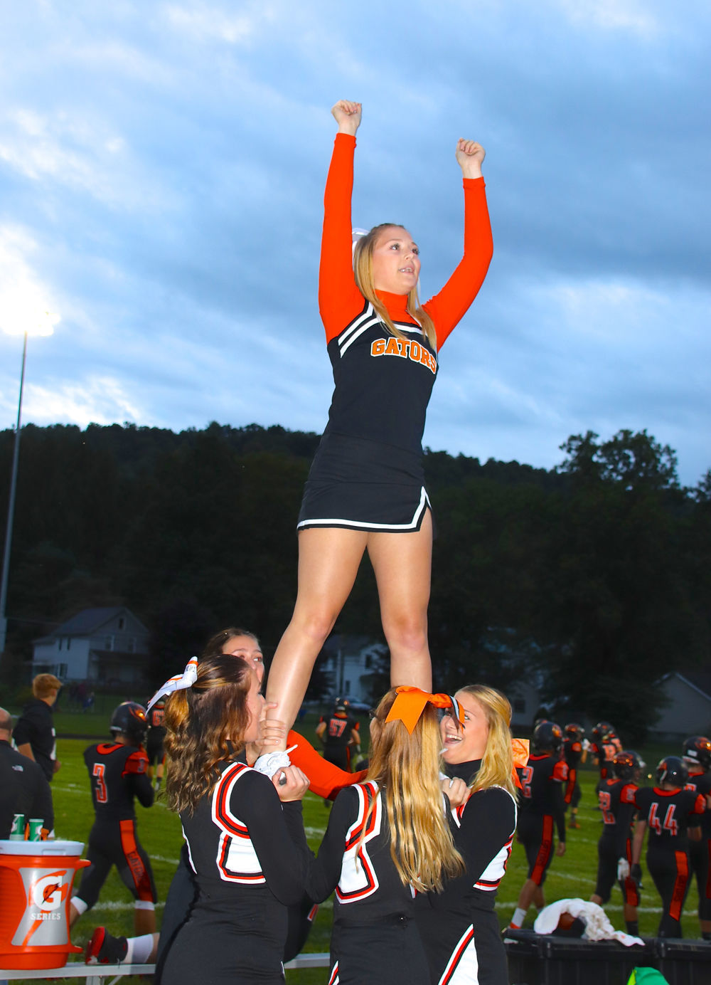 Cheerleaders lead fans Friday night