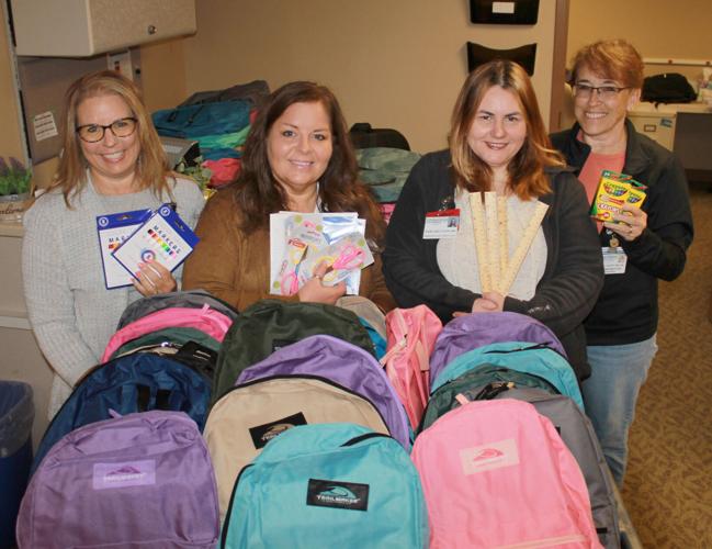 Medical center, hospital donate backpacks to area students
